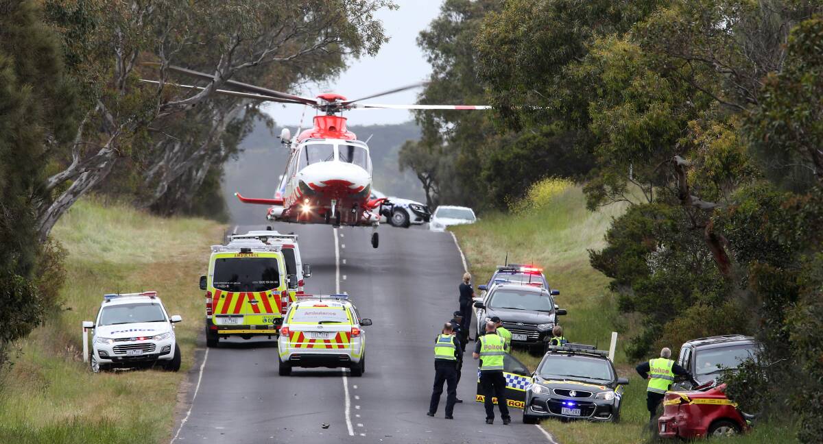 THE SCENE: Emergency service personnel at the horror road smash outside Geelong in which Melanie Ranken received critical injuries. Picture: Glenn Ferguson