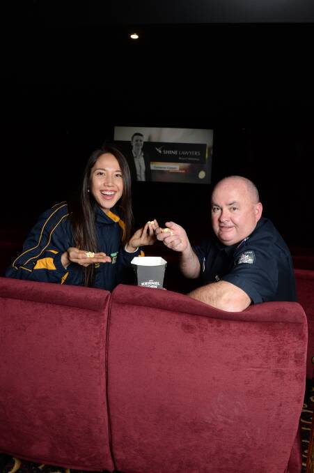 GETTING OUT THE POPCORN: Rush player, Joy Burke and Leading Senior Constable, Des Hudson are excited to host a movie night for Ballarat's Youth at Regent Cinemas.