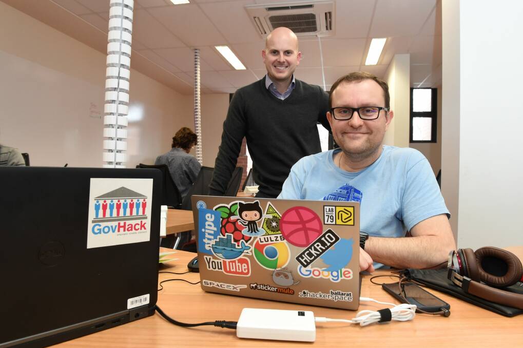 Hacking for a cause: City of Ballarat's Matt Swards with Ballarat Hackerspace president Scott Weston ahead of GovHack.  Picture: Lachlan Bence. 