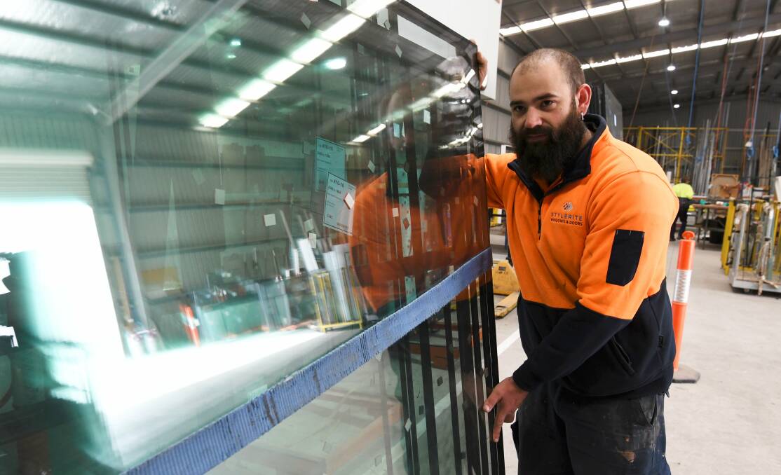 New business: Stylerite Windows and Doors employee Matt Davenport hard at work in the company's Ring Road warehouse, which formerly housed Ballarat Windows and Doors prior to liquidation. Picture: Lachlan Bence 