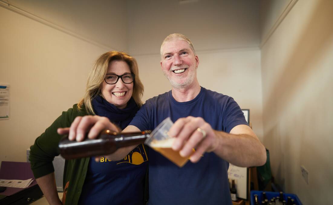 Top quality drop: Anne Lucas and Malcolm Sachs from Cubby Haus Brewing were busy keeping the masses hydrated on Saturday afternoon.  Picture: Luka Kauzlaric. 