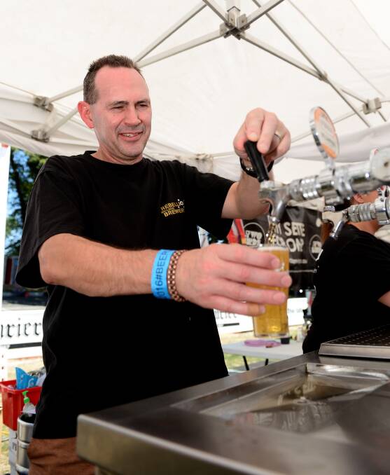 Local flavour: Andrew Lavery from Rebellion Brewing pours a beer at the 2016 Ballarat Beer Festival.  Picture: Dylan Burns. 