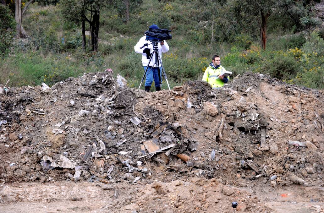 A trench dug in 2012 revealing waste on private land near the Black Hill landfill