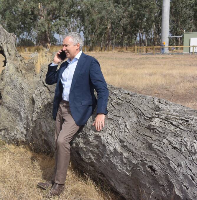 Checking the service: Telstra chief executive Andrew Penn makes the most of the new signal at the unveiling of the 100th mobile black spot tower in Culla.  