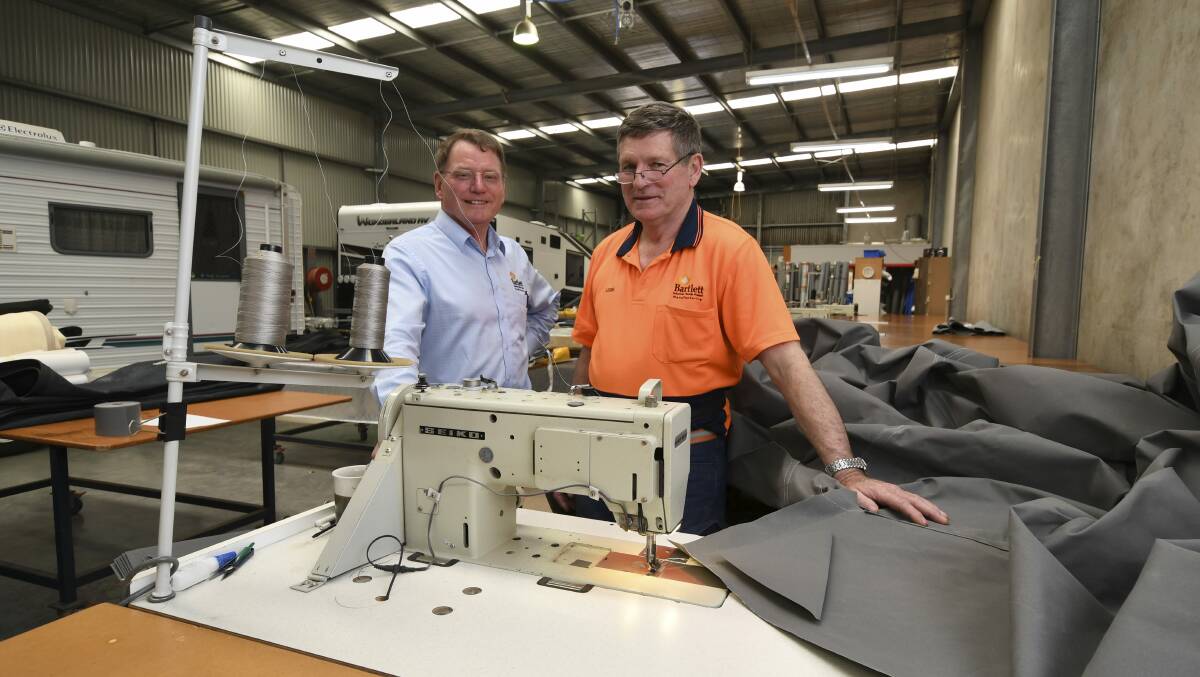 New direction: Bartlett Manufacturing director Keith Bartlett with industrial sewing machinist Leigh Danne at the company's canvas workshop in Wendouree, which is set to ramp up production. Picture: Lachlan Bence 