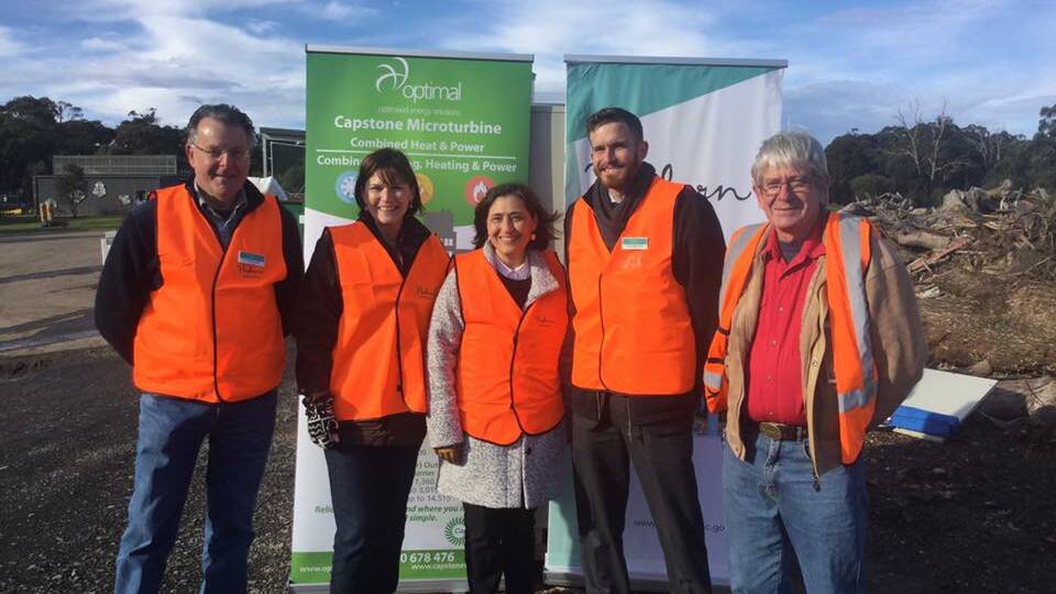 Hepburn Shire councillors John Cottrell and Don Henderson (left and right) with Macedon Ranges MP Mary-Anne Thomas (centre-left), Energy, Environment and Climate Change Minister Lily D’Ambrosio (centre) and mayor Sebastian Klein (centre-right).    
