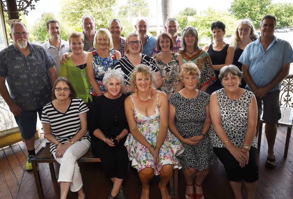 Reminiscing: Members of Golden Point Primary School's class of 1971 celebrate 52 years since starting school at Seymor's on Lydiard. Picture: Luka Kauzlaric.