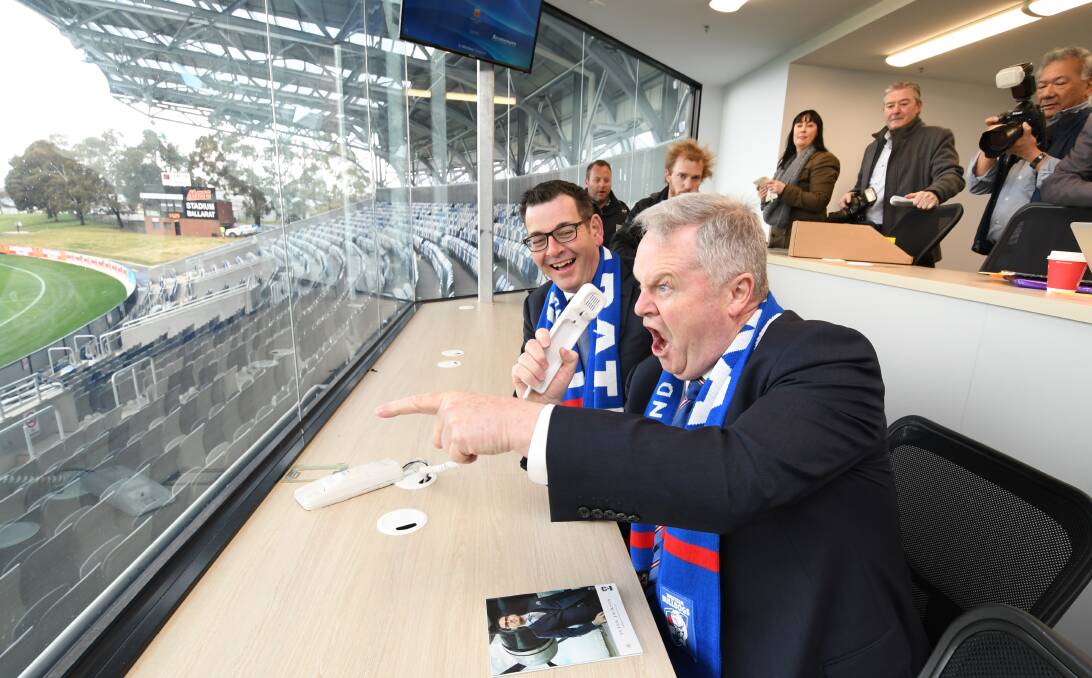 Almost time: Premier Daniel Andrews and Western Bulldogs chairman Peter Gordon get a feel for the coaches box at Mars Stadium on Thursday.  Picture: Lachlan Bence.   