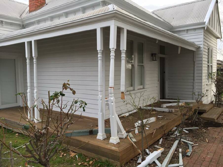 Destroyed: A vehicle veered off Eureka Street on Wednesday, ploughing through the fence of this recently renovated property.  Pictures: Supplied.  