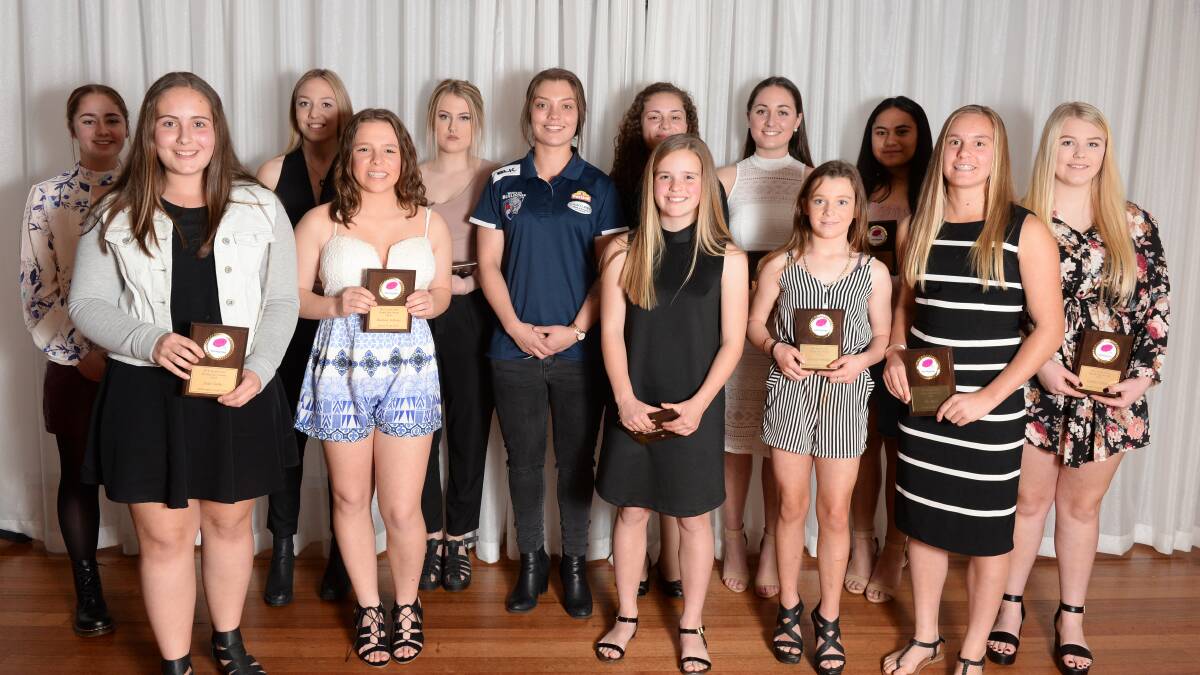 Winners of the rising star awards with Western Bulldogs player Ellie Blackburn.  Picture: Kate Healy.  