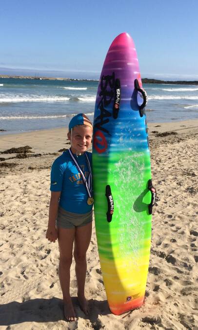 At home in the sea: 10-year-old Lily Jordan recently took home two gold medals from the Victorian Junior Surf Lifesaving Championships at Warrnambool. 