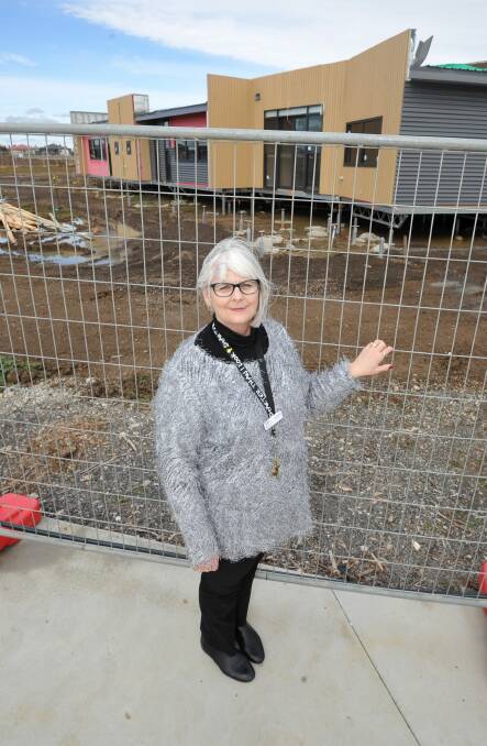 Growing: Siena Catholic Primary School principal Jo Brewer at the second stage of the development, expected to be opened this year.  Picture: Lachlan Bence. 