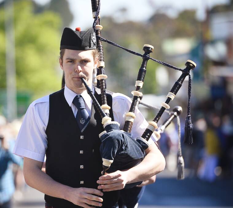 In fine form: Tim Koenig of the Daylesford RSL band entertains the crowds at the Daylesford Highland Gathering on Saturday.  Picture: Dylan Burns. 