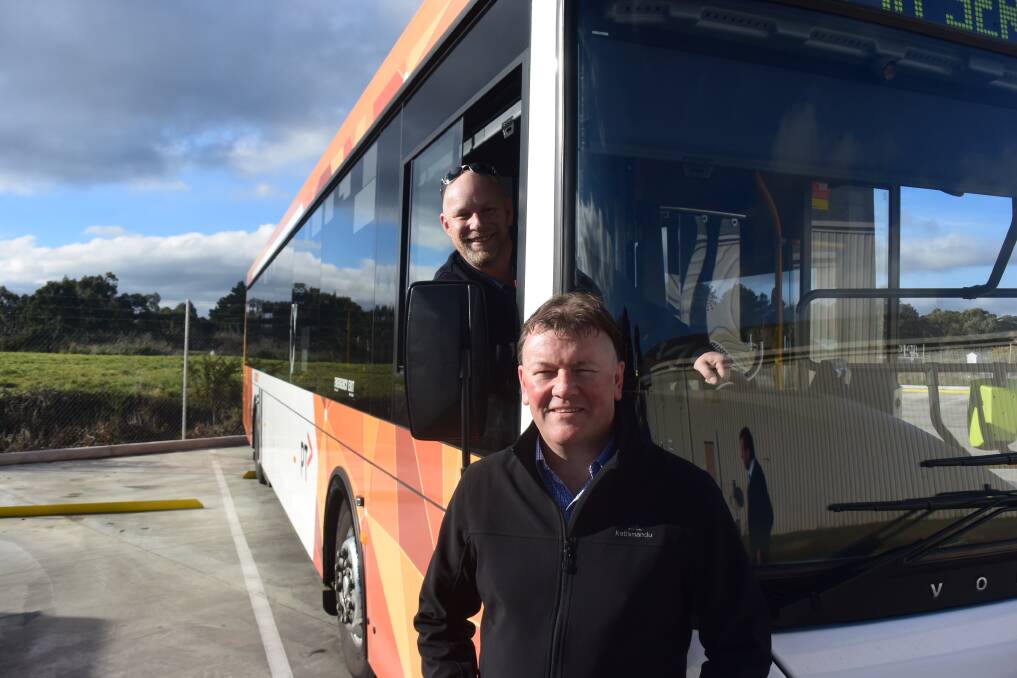 Safety first: CDC driver Ray Neville and service delivery manager Glenn McKenzie get a feel for the new Mobileye technology, which has been installed on 14 buses.  Picture: Brendan Wrigley.   