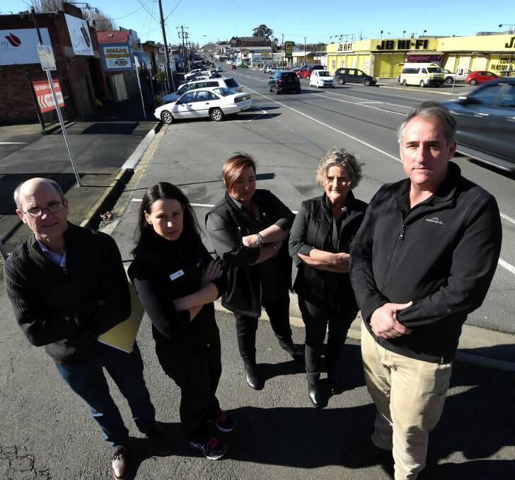 Parking shortage: Mair Street property owner Peter Keppel with Fernwood's Jacqui Gepp, Donna Blackburn and Julie Brown from Dollar Blinds and Curtains and Richard McClure from Stems Flower Market.  Picture: Lachlan Bence.  