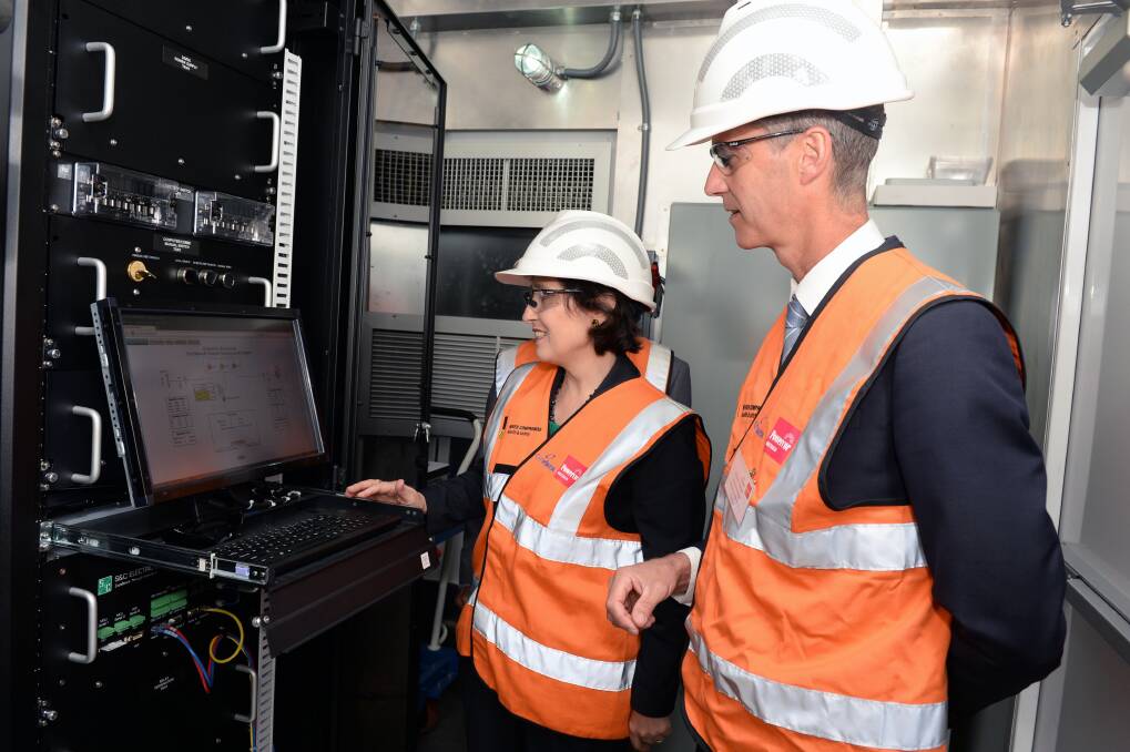 Industry, Energy and Resources Minister Lily D'Ambrosio and Powercor electricity networks general manager Steven Neave at the unveiling of the Buninyong Battery in 2016. Picture: Kate Healy 