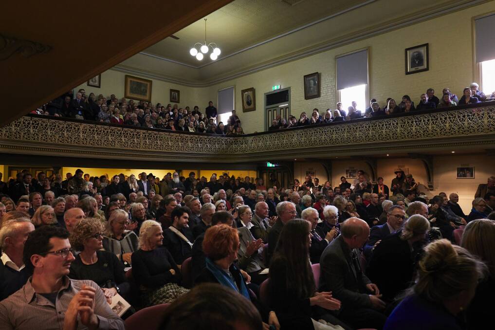 Hundreds of people packed out the Daylesford Town Hall for Rod May's memorial service.  Picture: Luka Kauzlaric.  