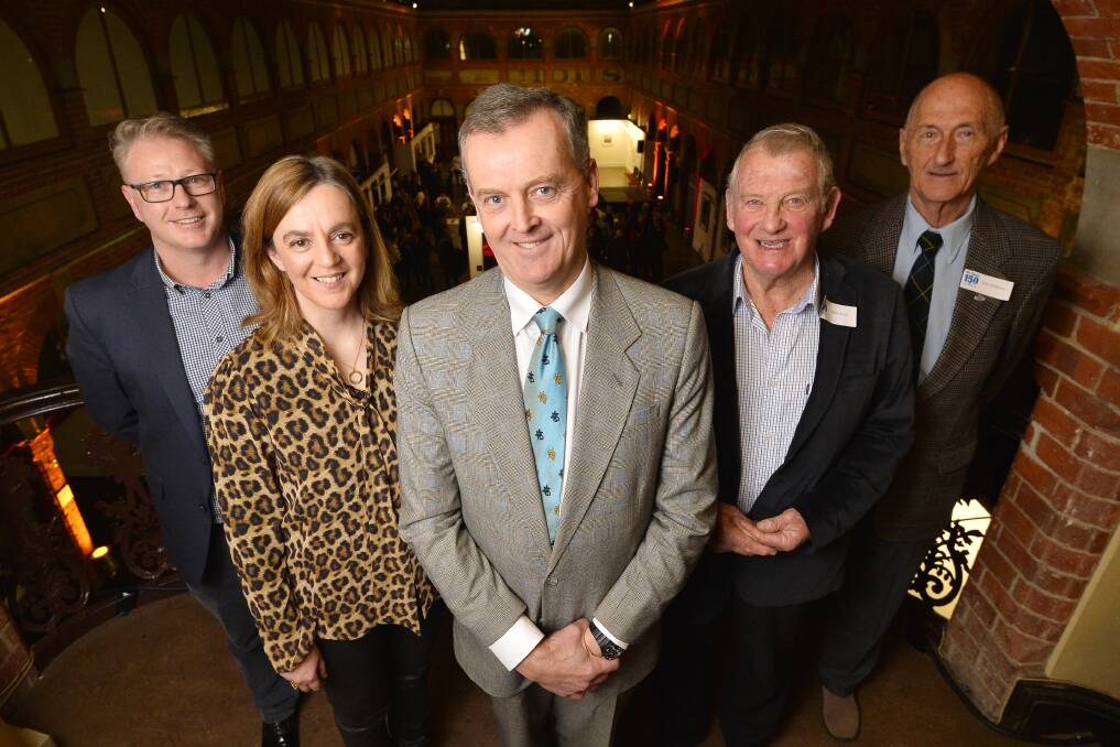 Taking a look back: The Courier editor Eugene Duffy with former print site manager Mark Collins, former editors Angela Carey and Ted Davey and former general manager Bob Matthews. Pictures: Dylan Burns 