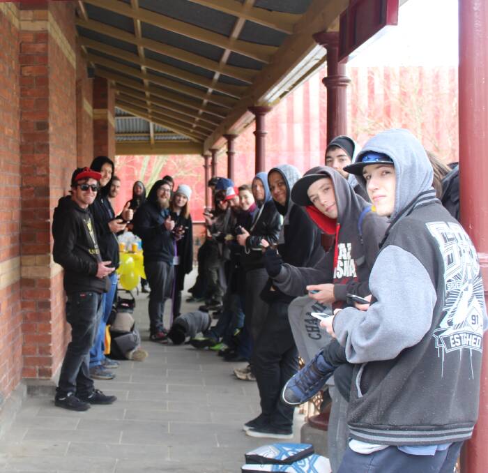 Positive Pokemon: Some of Team Yellow Ballarat at their gathering in Camp St. The Camp Street site is known to be a Pokemon hot-spot. Photo. Team Yellow.