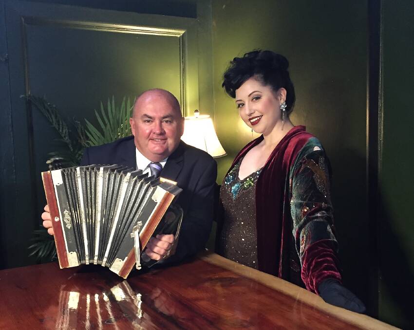 On with the show: Ballarat Mayor Des Hudson and Candice DeVille launching the upcoming Ballarat Heritage Weekend at Sutton's House of Music. Photo: Caleb Cluff.