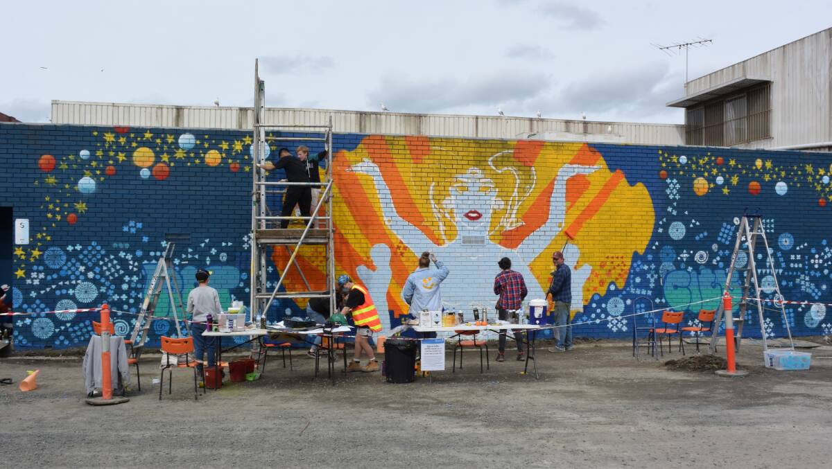 Earth Mother: the mural in its final stages at the rear of Bolton's Office Supplies in Field Street. Picture: Caleb Cluff.