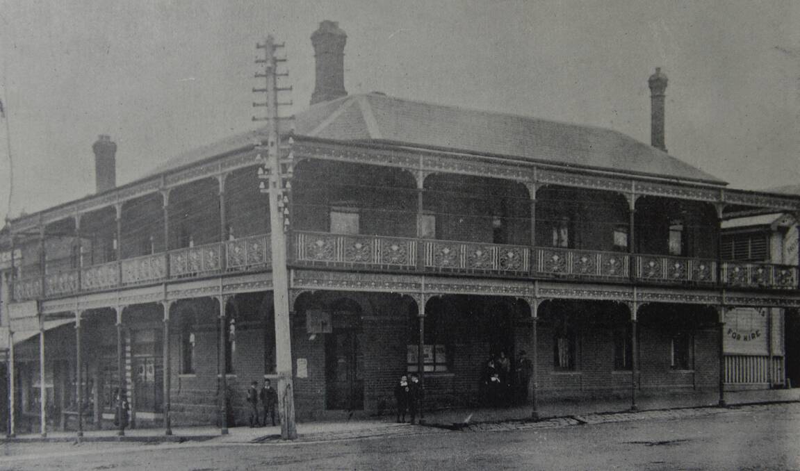 Long gone: The Peter Lalor in its former incarnation as the Royal Highlander Inn, with its magnificent and long-demolished verandahs. The stables are rear left.