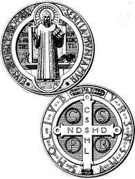 Resemblance: The medal of St Benedict resembles the crosses shaped into the gates. Picture: Abbey of St Mark.