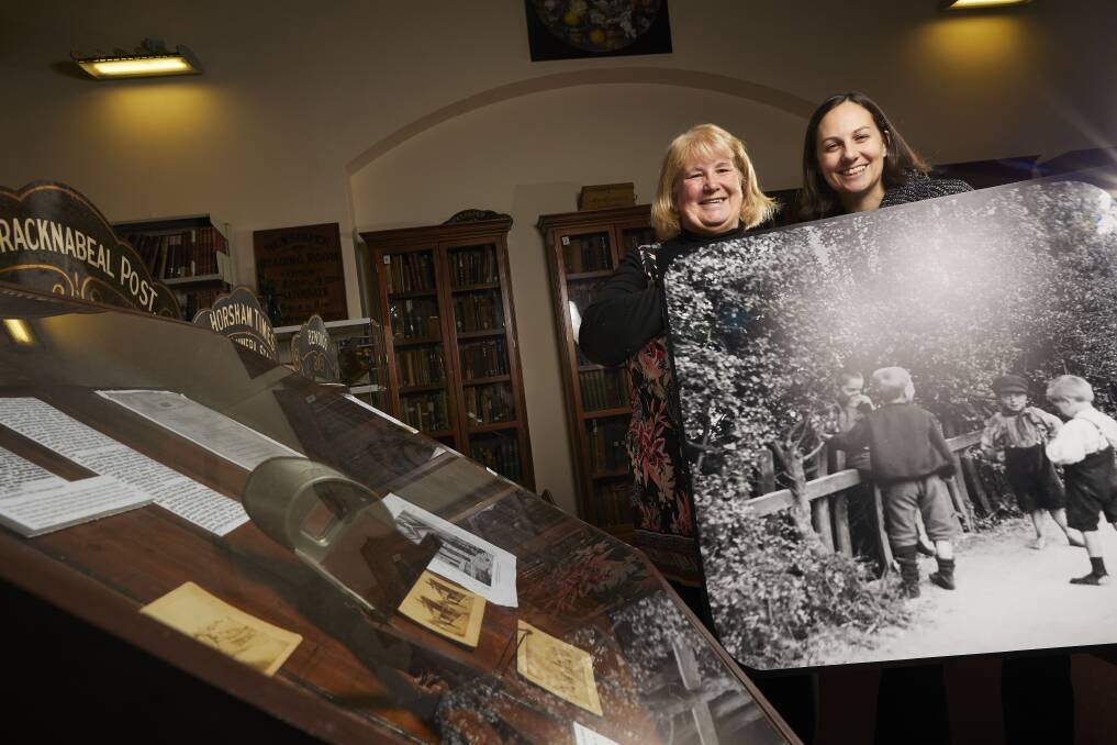 Sutton's genius: Lorayne Branch, Henry Sutton's great-granddaughter, and BMI curator Amy Tsilemanis with an image by Sutton. Picture: Luka Kauzlaric.
