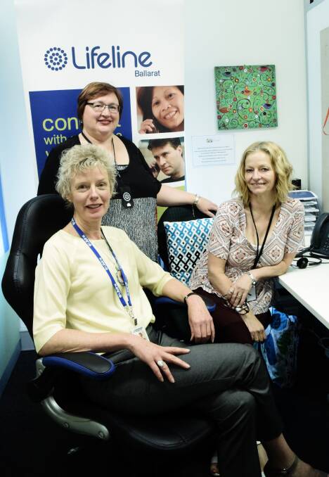 At the call: Lifeline's Michelle MacGillivray (front) with office staff Nicki Barton (rear) and Ros Fletcher. Calls to Lifeline peak after Xmas. Picture: Caleb Cluff.