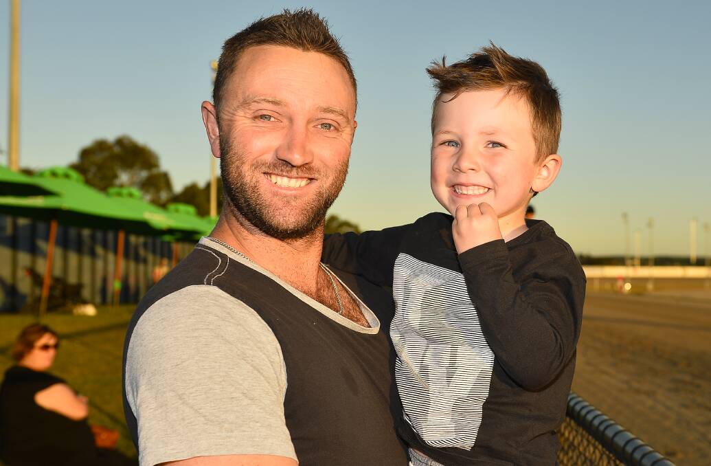 Ryan Rykers with his son Lachlan, 3, enjoying the action at the 2017 Ballarat Pacing Cup. Picture: Dylan Burns.