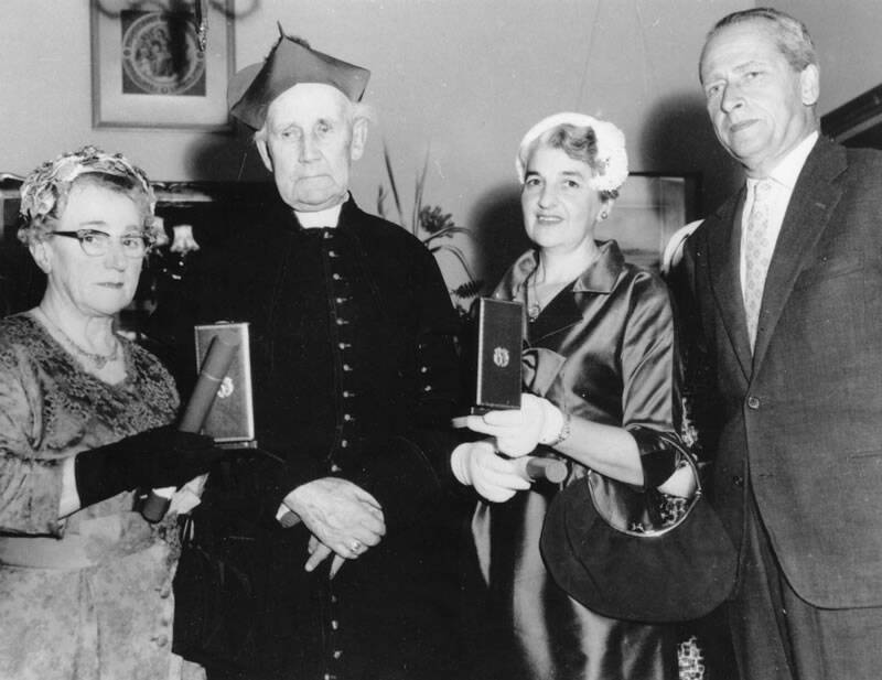 Archbishop Mannix with Lena Santospirito (left) and Lena Cincotta receiving the. Italian Star of Solidarity at Raheen in 1958. Mannix was a strong supporter of the Italian community.