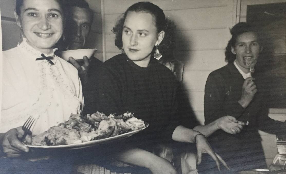 Serving Ukrainian food at a function in the 1950s. Picture: Vera Zylan.