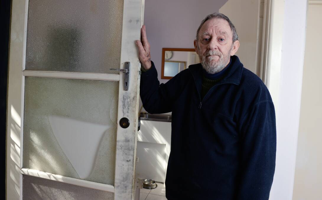 Break and enter: Alan Mathieson says the intruders used a screwdriver to crack the glass in his back door and get in. Picture: Kate Healy.