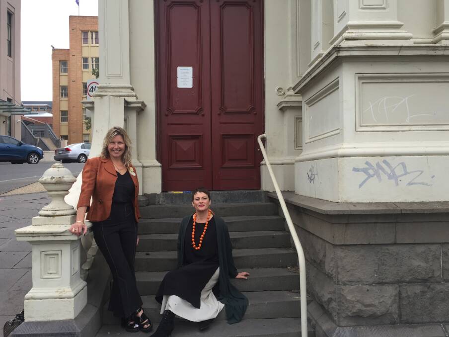 Another empty building: BAF chair Paula Nicholson and Ballarat Evolve founder Tara Poole on the steps of the decade-closed Ballarat Business Centre in Sturt Street. Picture: Caleb Cluff.
