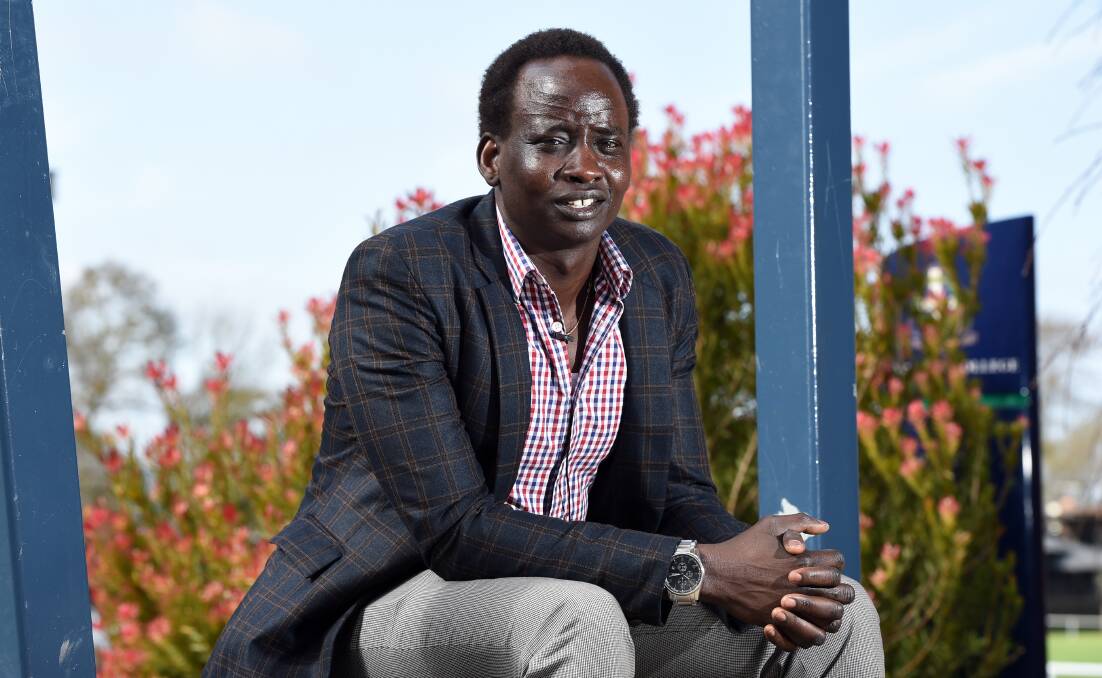 A new life: Isaac Thok Moses was a child soldier in South Sudan. His new life in Australia has seen him achieve a Masters degree in social science. Picture: Kate Healy.