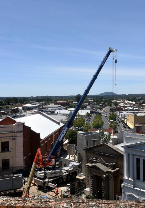 Rising quickly: the new commercial building at 22 Camp Street is rising quickly. Lost Ones Gallery on the right.Picture: Jeremy Bannister.