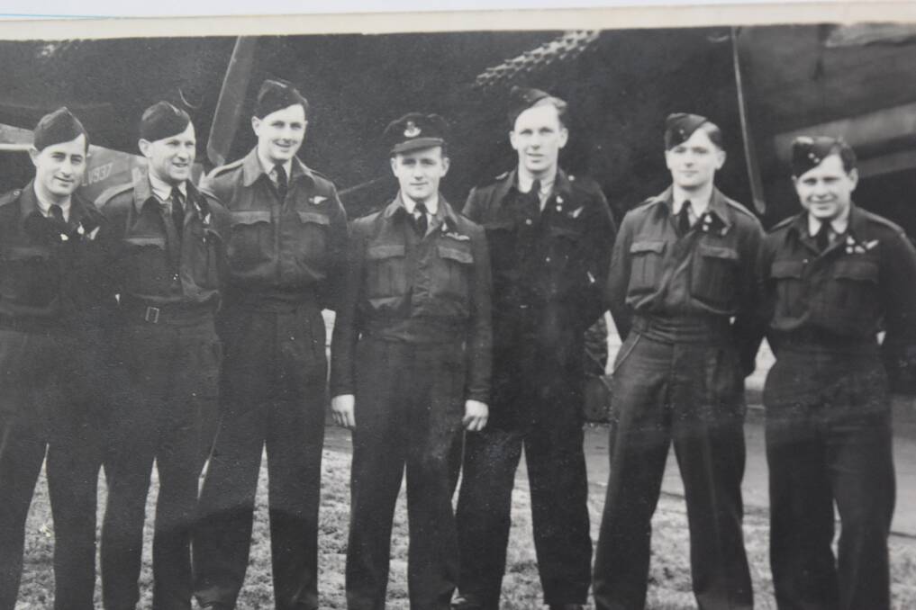Lurie Larmer, centre, with his air crew.