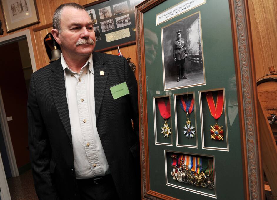  A VERY SAD CASE: military historian and ex-serviceman David Wright with a group of replica medals of Harold Elliott's presented to the Ranger Barracks in Ballarat. Photo: Lachlan Bence.