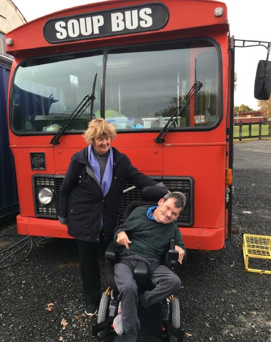 Helping the less fortunate: Soup Bus coordinator Fiona Gittings with donation champion Kieran Callinan. Picture: Nola Bradley.