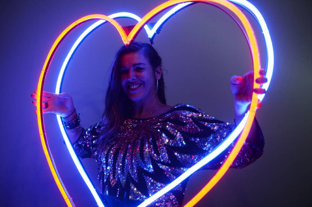 Neon lit lady: Carla O'Brien will bring her LED neon art to the streets of Ballarat for White Night in March. Picture: Kate Healy.