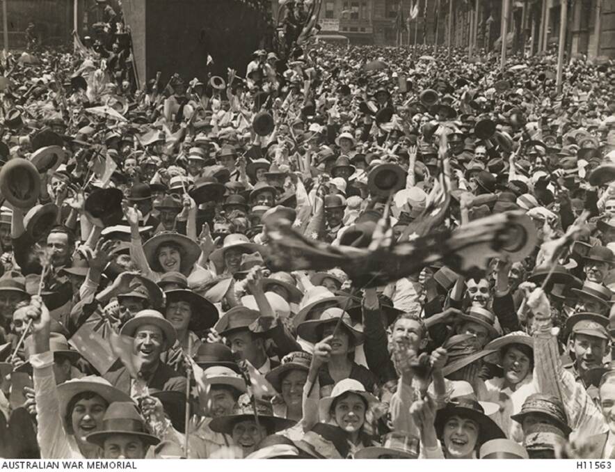 Sydney, NSW, 11 November 1918: a crowd in Martin Place celebrates the news of the signing of the armistice. Picture: Australian War Memorial.