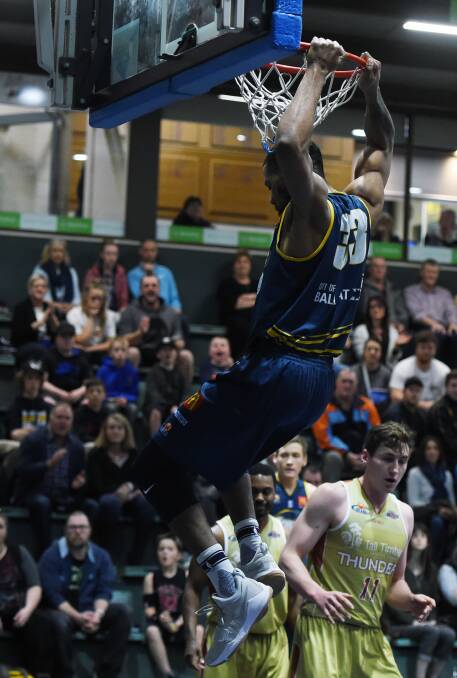 SHOW TIME: Miners' Marvin King-Davis gets some hang time at the Minerdome. He was influential in Ballarat's 19-point win over N W Tasmania. Pictures: Kate Healy