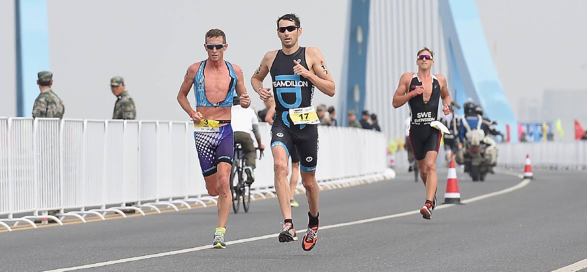RUN LEG: Ironman Luke Bell competes in the Ironman 70.3 in Hefei, China in October. Picture: Getty Images