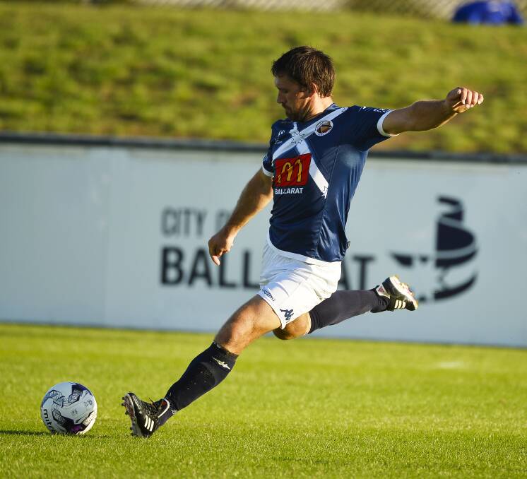 FORM SIDE: Ballarat City's Josh Romein launches the ball forward against Goulburn Valley this season. City is in great form with Melbourne City in its sights.