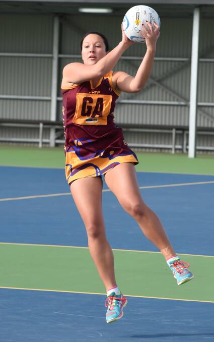 ON THE ATTACK: Redan's Ruby Rose Parry transitions the ball down the court in Saturday's 53-33 loss to Lake Wendouree. Picture: Lachlan Bence