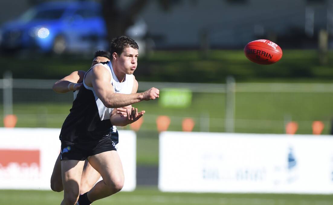 NOT FAR AWAY: Roosters hardnut Luke Kiel is nearly over his hamstring complaint and will be a welcome return to North Ballarat's midfield.