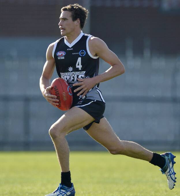 RUN AND CARRY: Rebel Aiden Domic's running capacity is something that he will be hoping appeals to an AFL club.