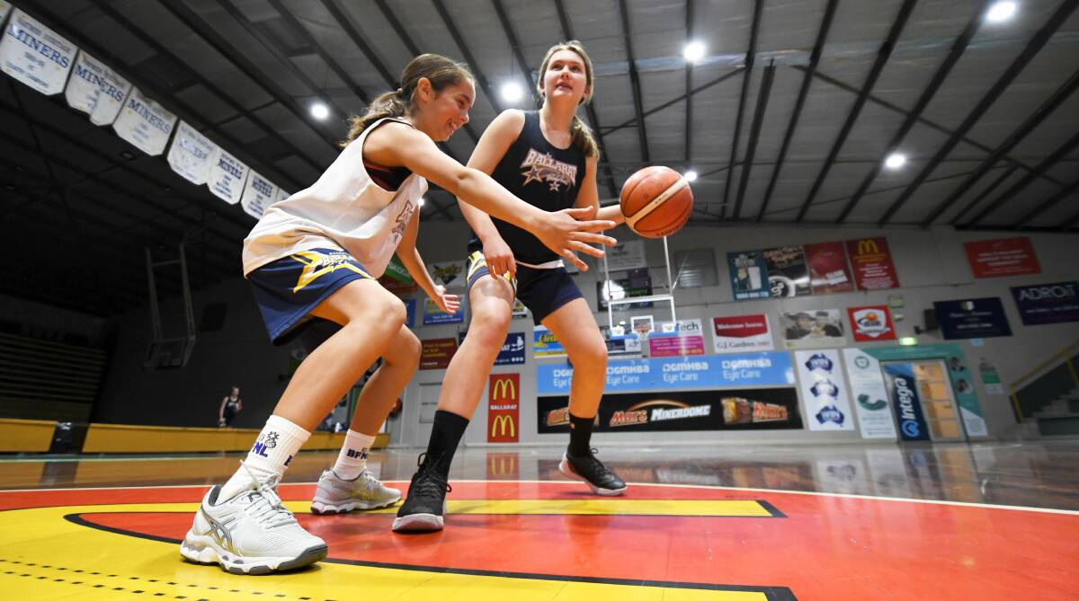 STRONG JUNIOR SYSTEM: Junior Ballarat Rush players Jemma Amoore and Jada Skennerton take to the Minerdome court. Picture: Lachlan Bence.