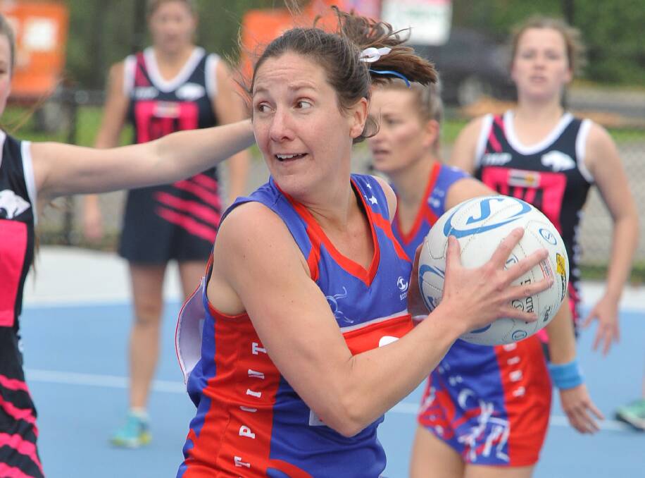 WINNER: Kate Martin looks for options during East Point's win over Melton South. The result maintained the Kangaroos' unbeaten start to the year. Picture: Lachlan Bence.
