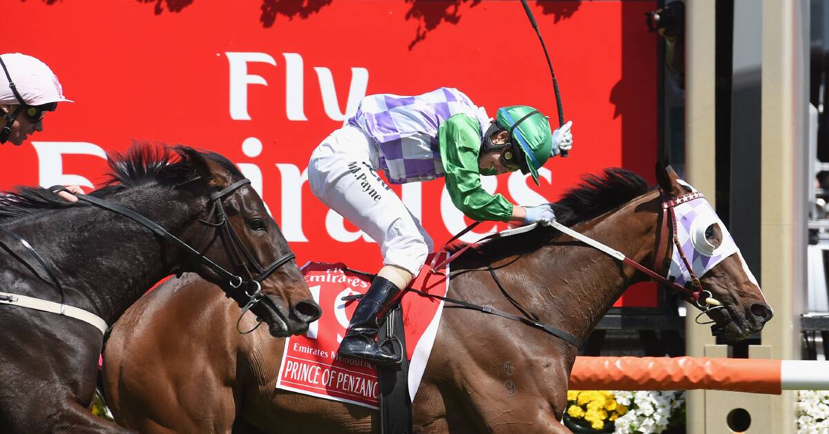 MEMORABLE MOMENT: Michelle Payne and Prince of Penzance cross the line to win the 2015 Melbourne Cup. Picture: Getty Images.